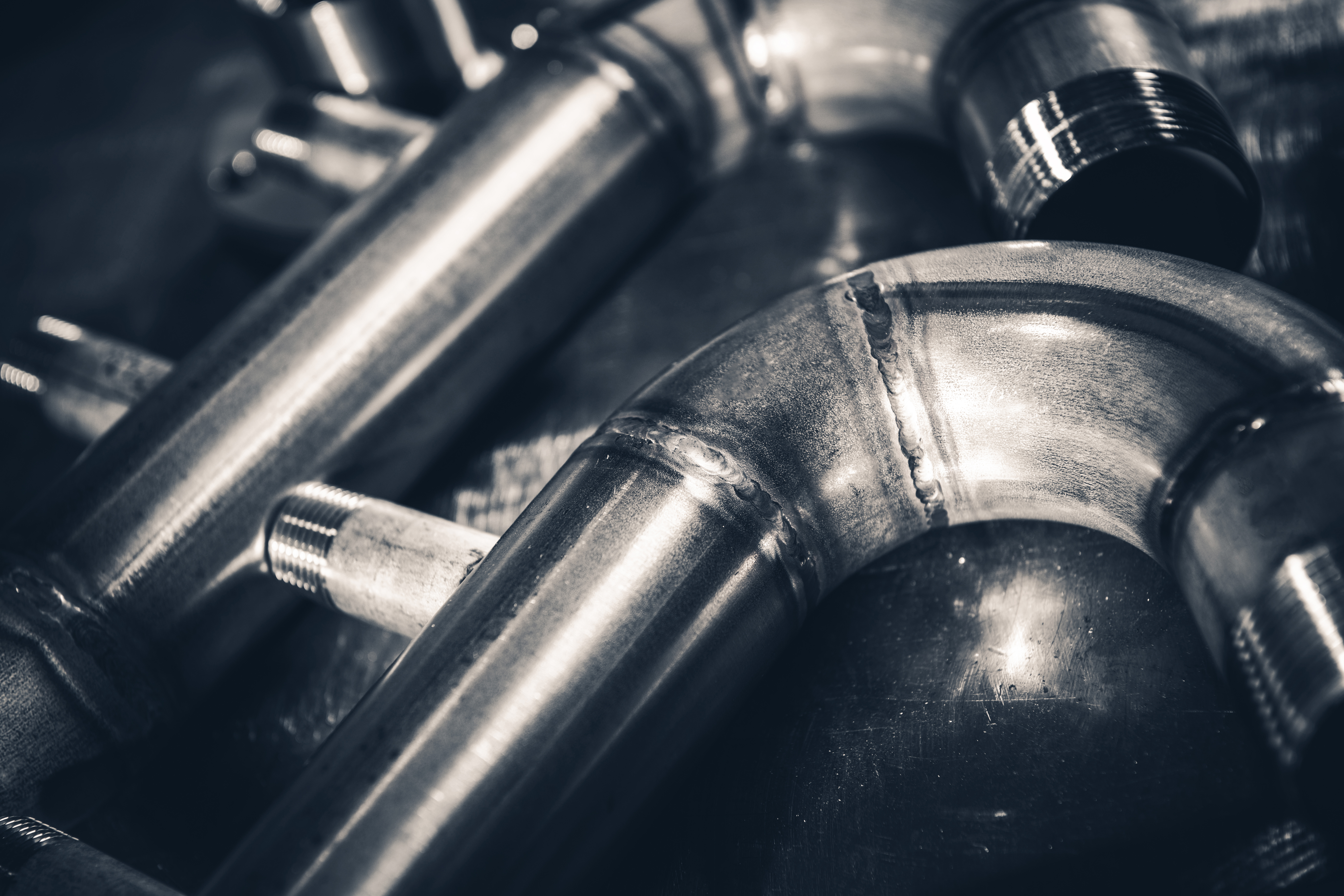 Close-up of industrial metal pipes and fittings
